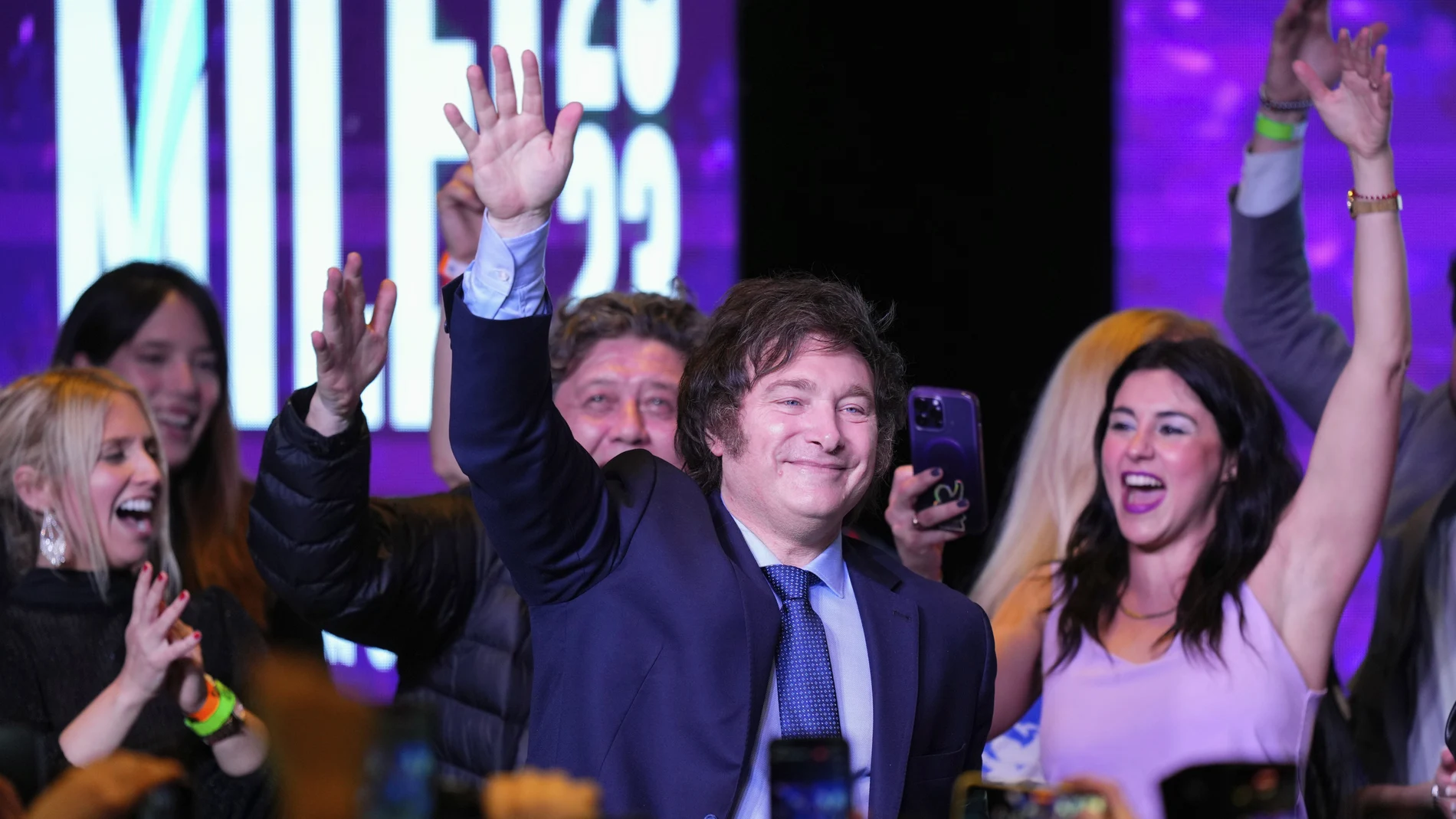 Javier Milei, presidential candidate of the Liberty Advances coalition, waves at his campaign headquarters after polls closed for general elections in Buenos Aires, Argentina, Sunday, Oct. 22, 2023.
