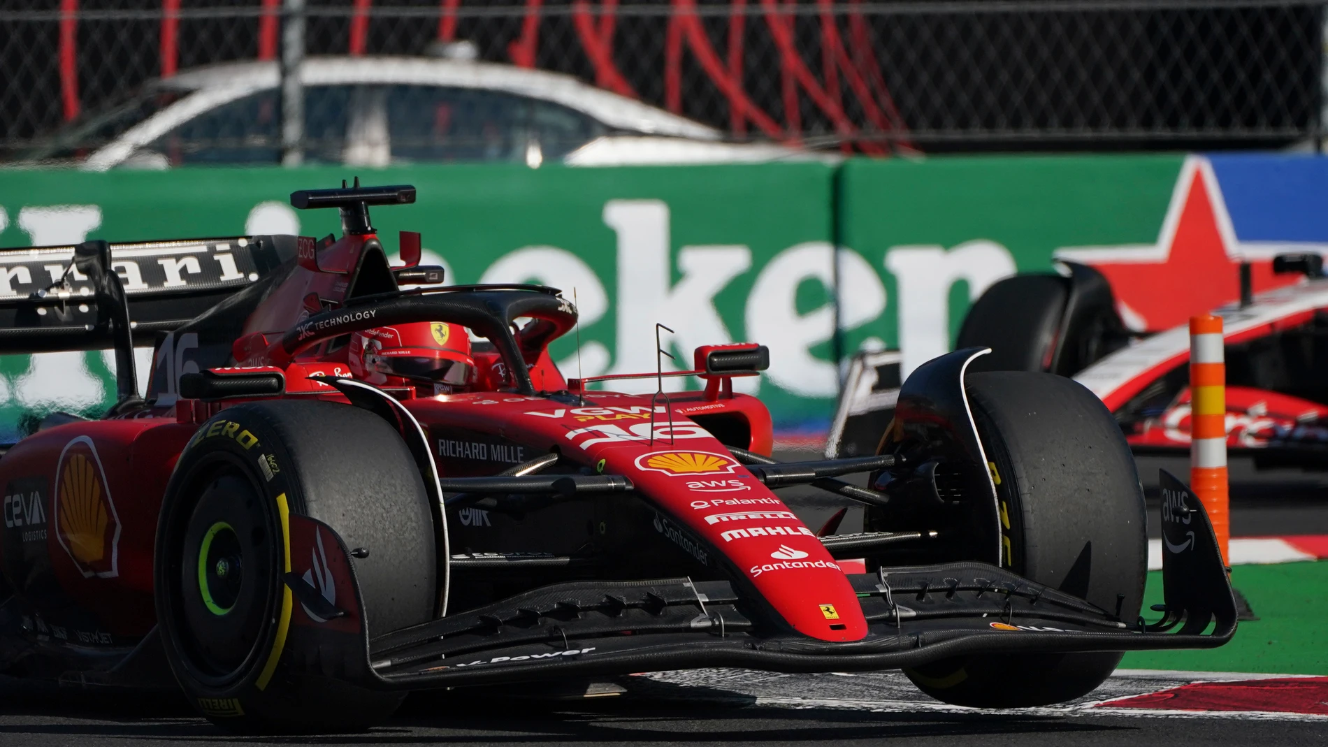 Charles Leclerc, of Monaco, steers his Ferrari during the pole position of the Formula One Mexico Grand Prix auto race at the Hermanos Rodriguez racetrack in Mexico City, Saturday, Oct. 28, 2023. (AP Photo/Tomas Stargardter)
