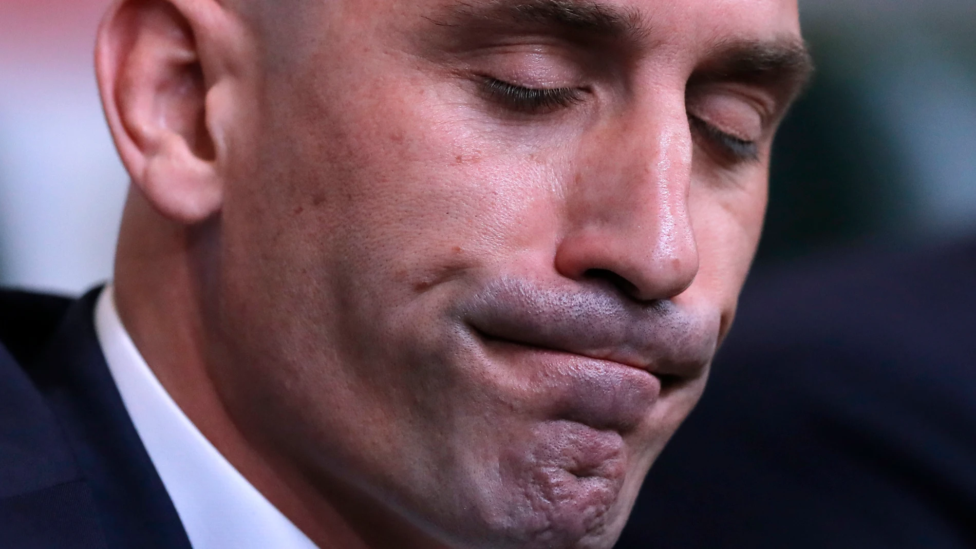 FILE - Spanish football president Luis Rubiales grimaces during a press conference at the 2018 soccer World Cup in Krasnodar, Russia, Wednesday, June 13, 2018. FIFA has banned ousted former Spanish soccer federation president Luis Rubiales from the sport for three years. He was judged for misconduct at the Women’s World Cup final where he forcibly kissed a player on the lips at the trophy ceremony. FIFA did not publish details of the verdict reached by its disciplinary committee judges. (AP P...