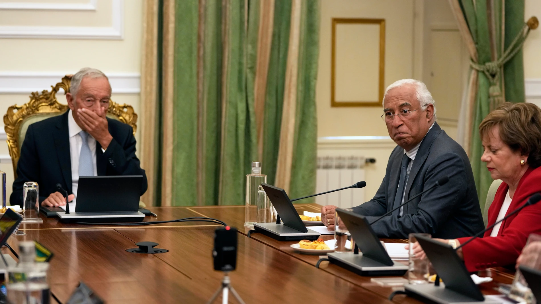 Outgoing Portuguese Prime Minister Antonio Costa, centre, and President Marcelo Rebelo de Sousa, left, attend the State Council meeting called by the president at the Belem presidential palace in Lisbon, Thursday, Nov. 9, 2023. On Tuesday, Prime Minister Costa resigned while his government is involved in a widespread corruption probe. After the council meeting, Rebelo de Sousa is expected to announce if he will call early elections or try to appoint a new prime minister. (AP Photo/Armando Fra...
