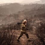 Málaga.- Sucesos.-Aumentan los desalojos preventivos en torno al incendio forestal que afecta a una zona de Mijas Pueblo