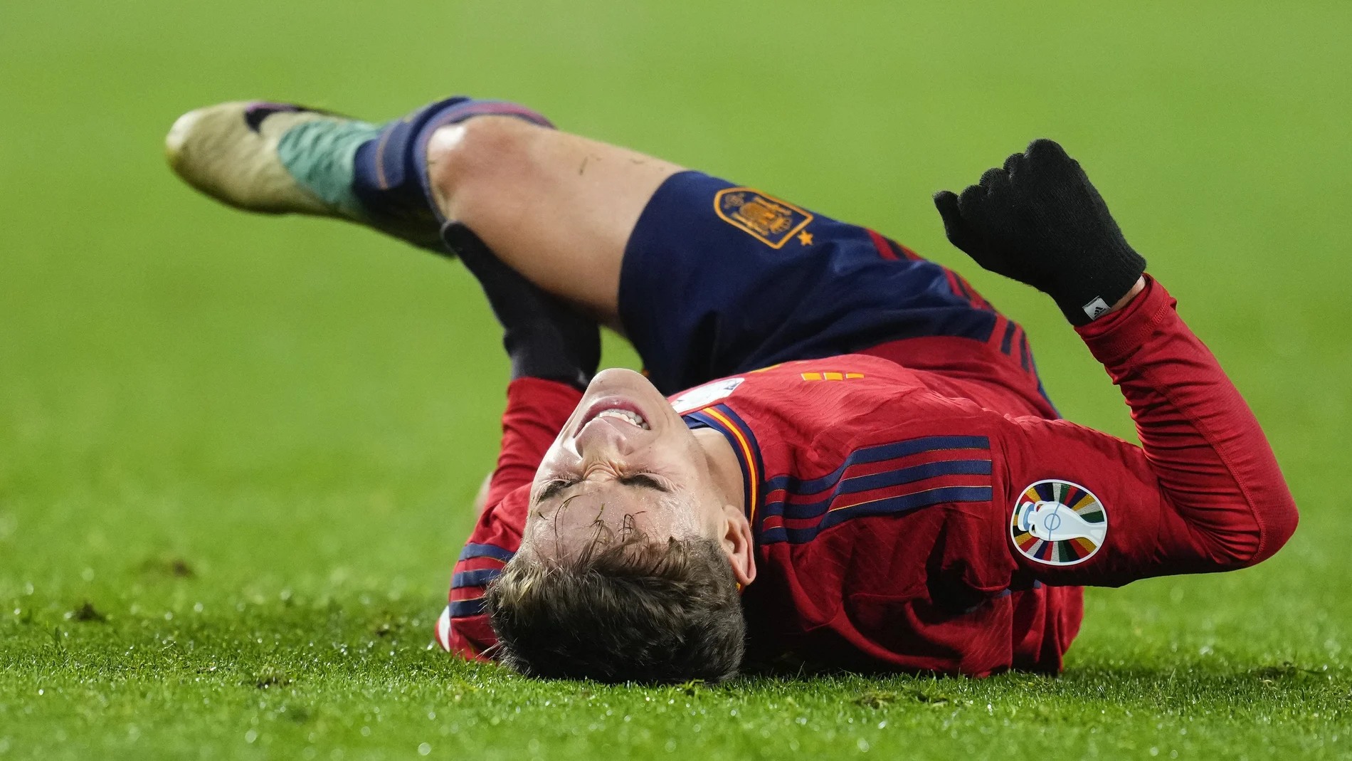 Spain's Gavi Paez reacts after injuring his leg during the Euro 2024 group A qualifying soccer match between Spain and Georgia at Jose Zorrilla Stadium in Valladolid, Spain, Sunday, Nov. 19 23, 2023. 