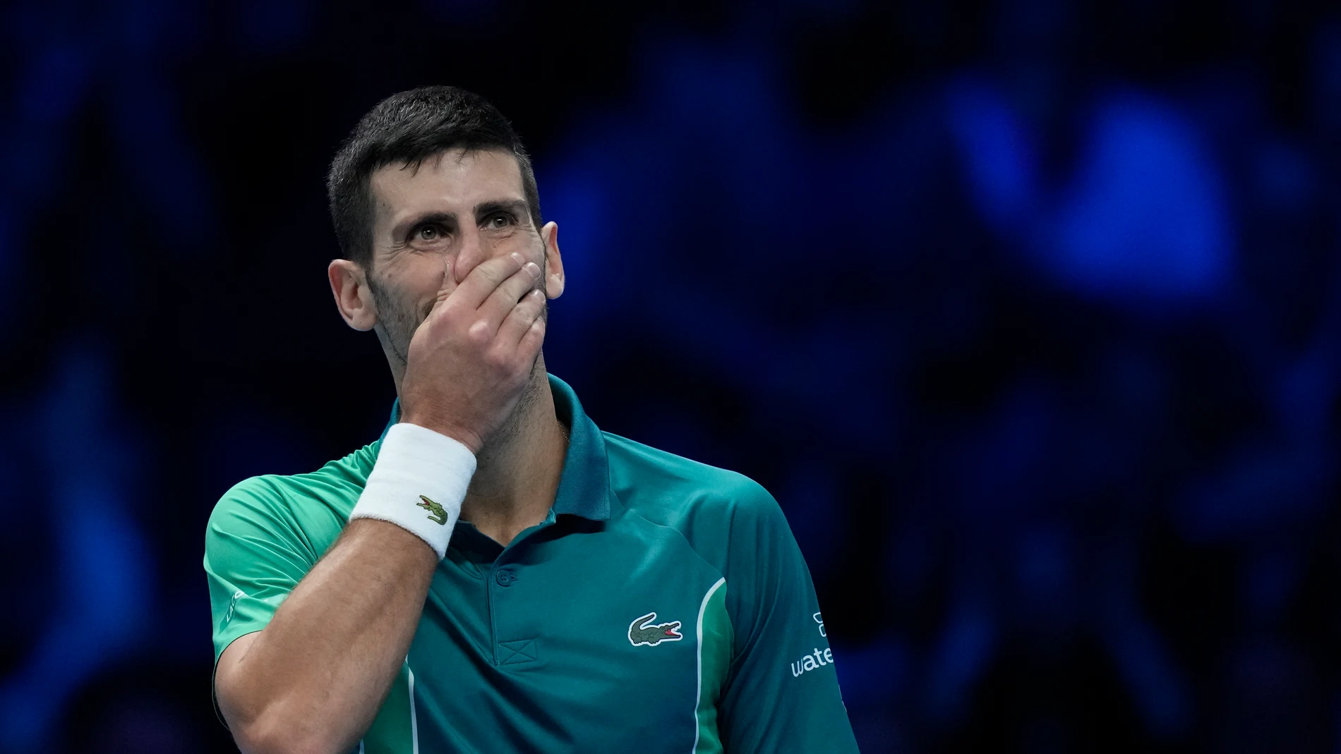 Serbia's Novak Djokovic reacts after losing a point to Italy's Jannik Sinner during their singles final tennis match of the ATP World Tour Finals at the Pala Alpitour, in Turin, Italy, Sunday, Nov. 19, 2023. (AP Photo/Antonio Calanni)