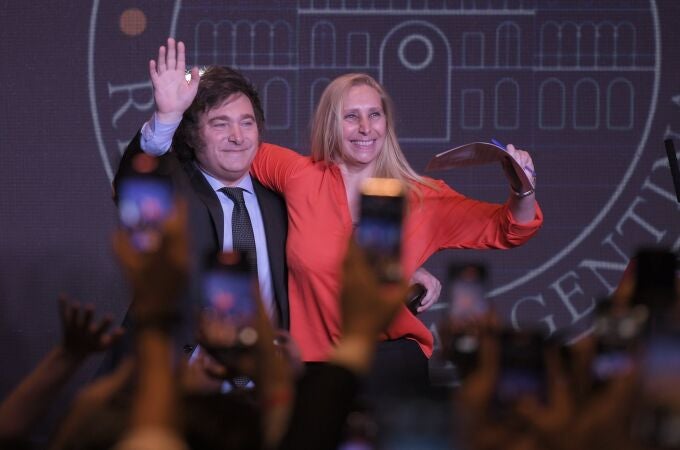 Buenos Aires: Javier Milei (L), presidential candidate of the libertarian party La Libertad Avanza, and his sister Karina Milei wave at the campaign headquarters after their party's victory in the run-off election