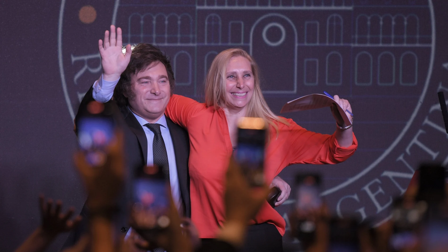 Buenos Aires: Javier Milei (L), presidential candidate of the libertarian party La Libertad Avanza, and his sister Karina Milei wave at the campaign headquarters after their party's victory in the run-off election