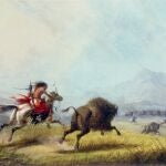 Búfalo perseguido por una cazadora, pintura de Alfred Jacob Miller.