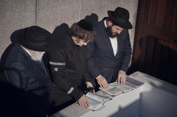 Argentina's President-elect, Javier Milei, center, prays next to Chabad-Lubavitch rabbis at the resting place of the Rebbe, Rabbi Menachem Mendel Schneerson, at Montefiore Cemetery on Monday, Nov. 27, 2023, in the Queens borough of New York. 