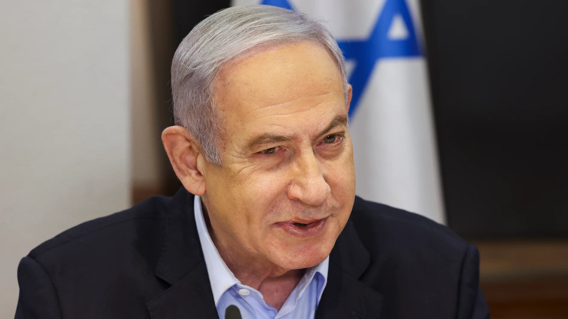 Israeli Prime Minister Benjamin Netanyahu convenes the weekly cabinet meeting at the Defence Ministry in Tel Aviv, Israel, Sunday Jan. 7, 2024. (Ronen Zvulun/Pool via AP)