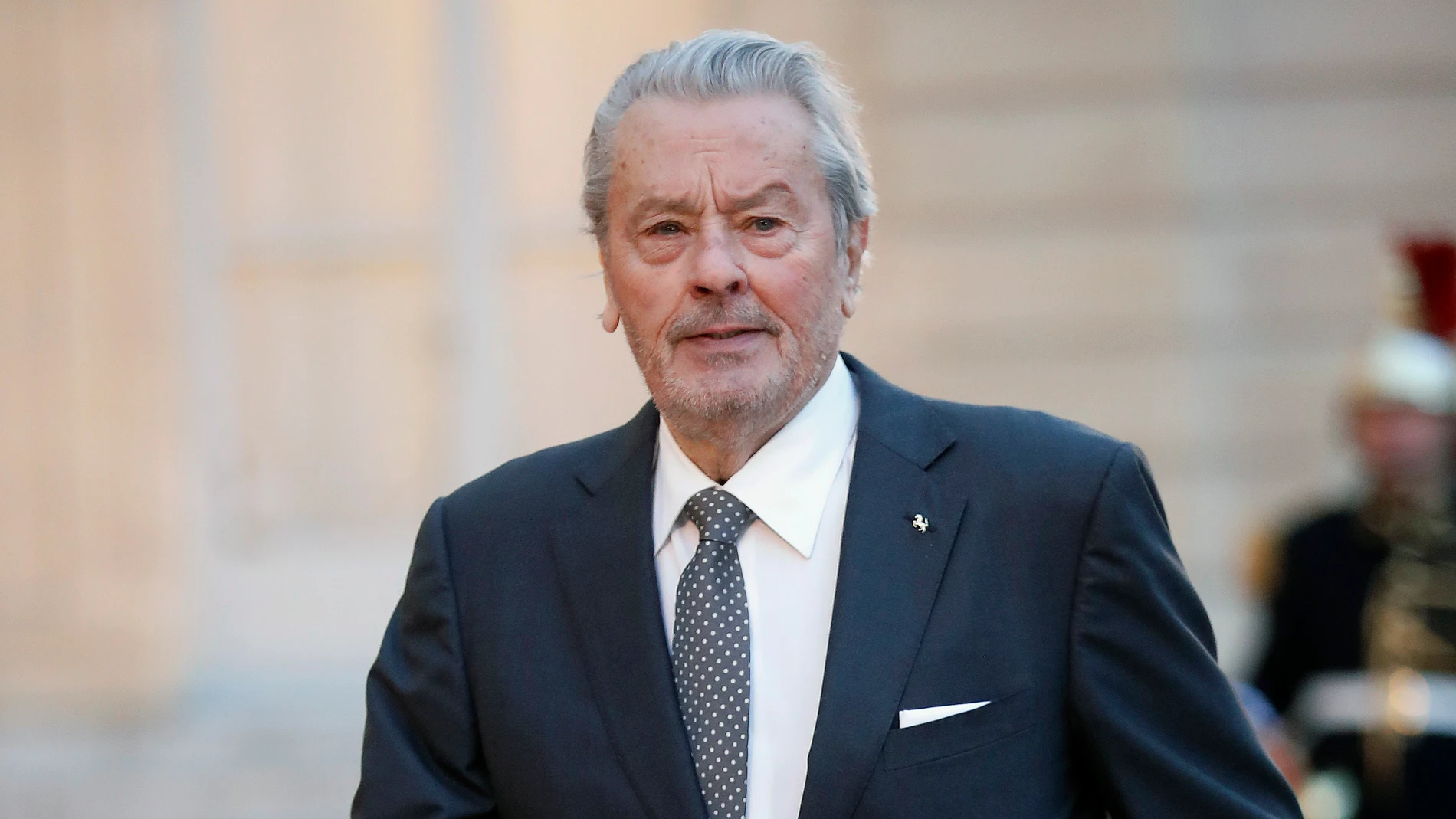 French actor Alain Delon arrives to attend a state dinner at the Elysee Palace, in Paris, Monday, March 25, 2019. Chinese President Xi Jinping is on a 3-day state visit in France where he is expected to sign a series of bilateral and economic deals on energy, the food industry, transport and other sectors. 