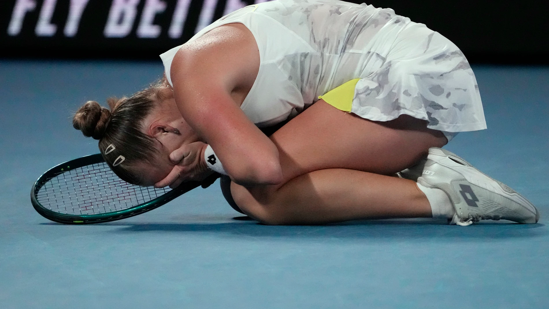 Anna Blinkova of Russia reacts after defeating Elena Rybakina of Kazakhstan in their second round match at the Australian Open tennis championships at Melbourne Park, Melbourne, Australia, Thursday, Jan. 18, 2024. (AP Photo/Andy Wong)