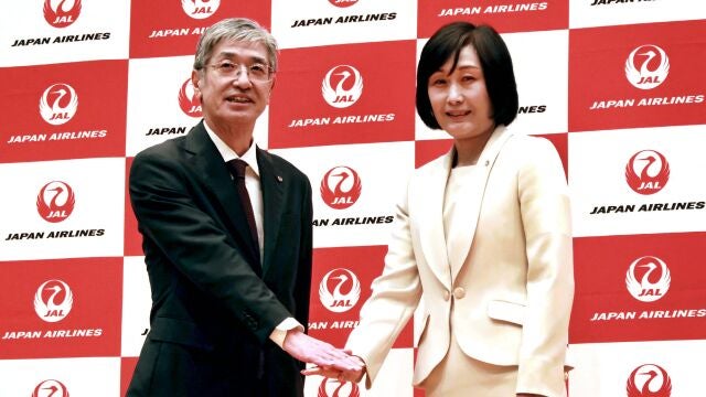Japan Airlines' Senior Managing Executive Officer Mitsuko Tottori (R), who will become the president of the carrier from April 1, and current president Yuji Akasaka pose for the media during a press conference in Tokyo on January 17, 2024. - Japan Airlines said on January 17 it will name its first woman president, a former cabin crew who is setting an extremely rare example of becoming a female leader at a major Japanese firm. (Photo by JIJI Press / AFP) / Japan OUT / JAPAN OUT