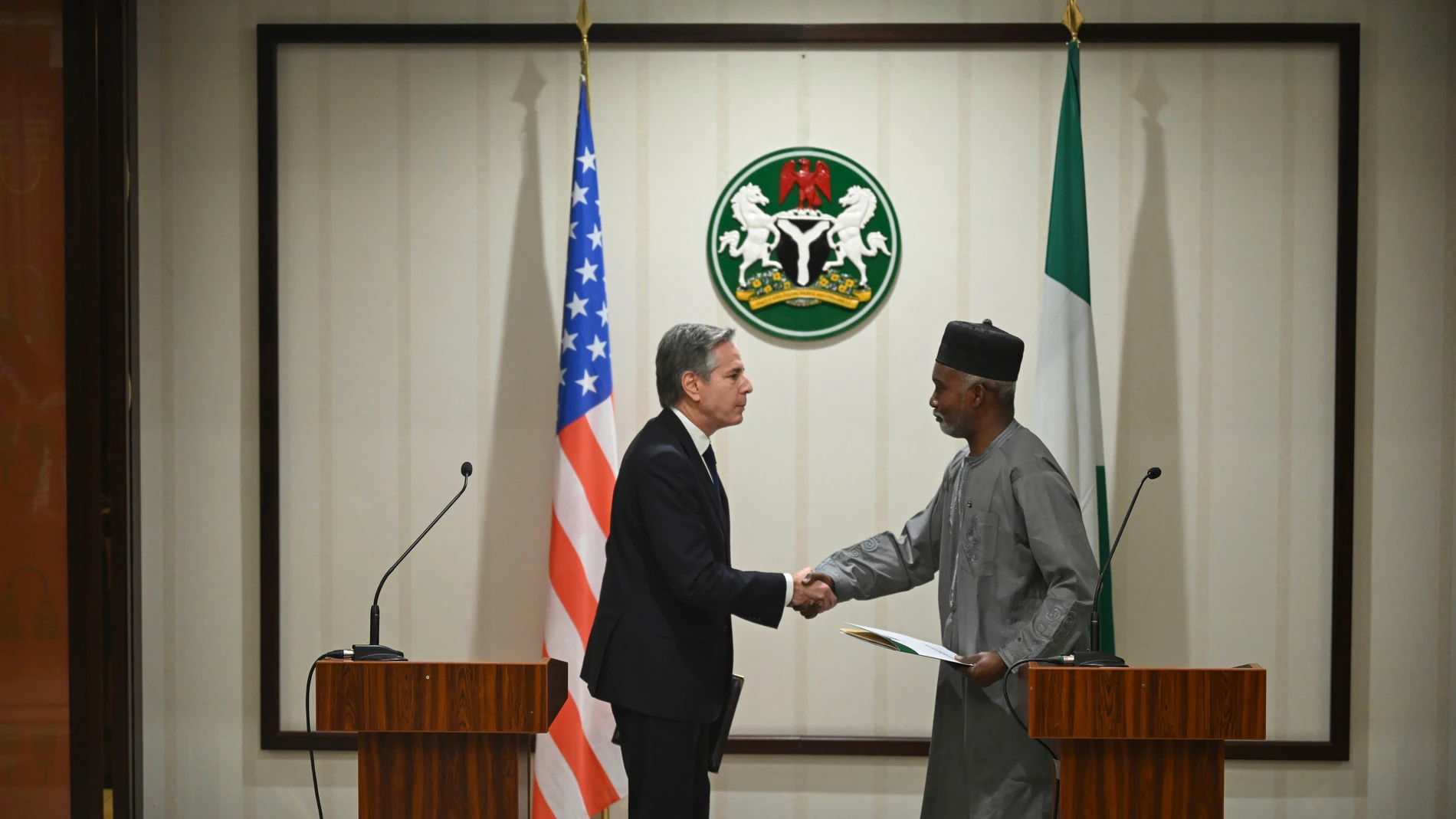 US Secretary of State Antony Blinken, left, shakes hands Nigeria's Minister of Foreign Affairs Yusuf Tuggar after a press conference at the Presidential Villa, in Abuja, Nigeria, Tuesday, Jan. 23, 2024. (Andrew Caballero-Reynolds/Pool Photo via AP)