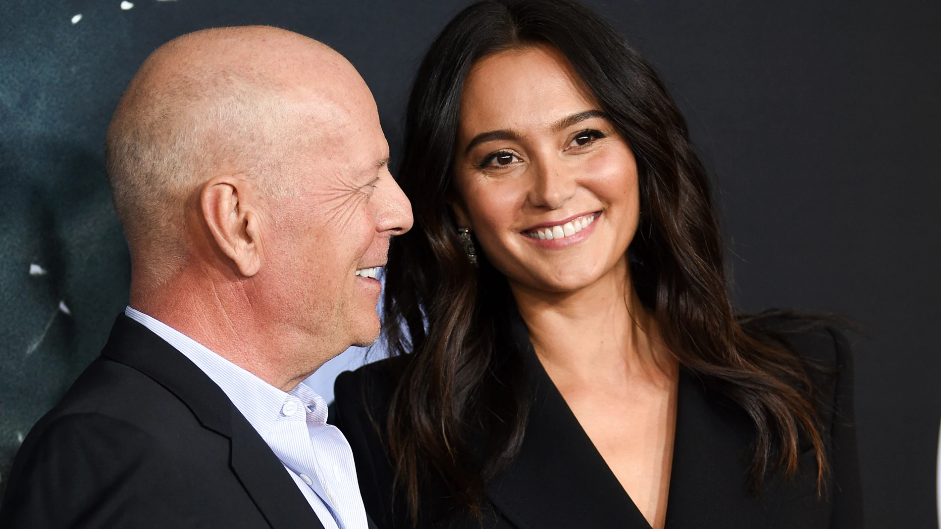 FILE - Actor Bruce Willis, left, and his wife Emma Heming Willis attend the premiere of "Glass" in New York on Jan. 15, 2019. Heming Willis is working on a guide to care giving that draws upon her experiences tending to her husband who has been diagnosed with frontotemporal dementia. The book, currently untitled, is scheduled for 2025. (Photo by Evan Agostini/Invision/AP, File)