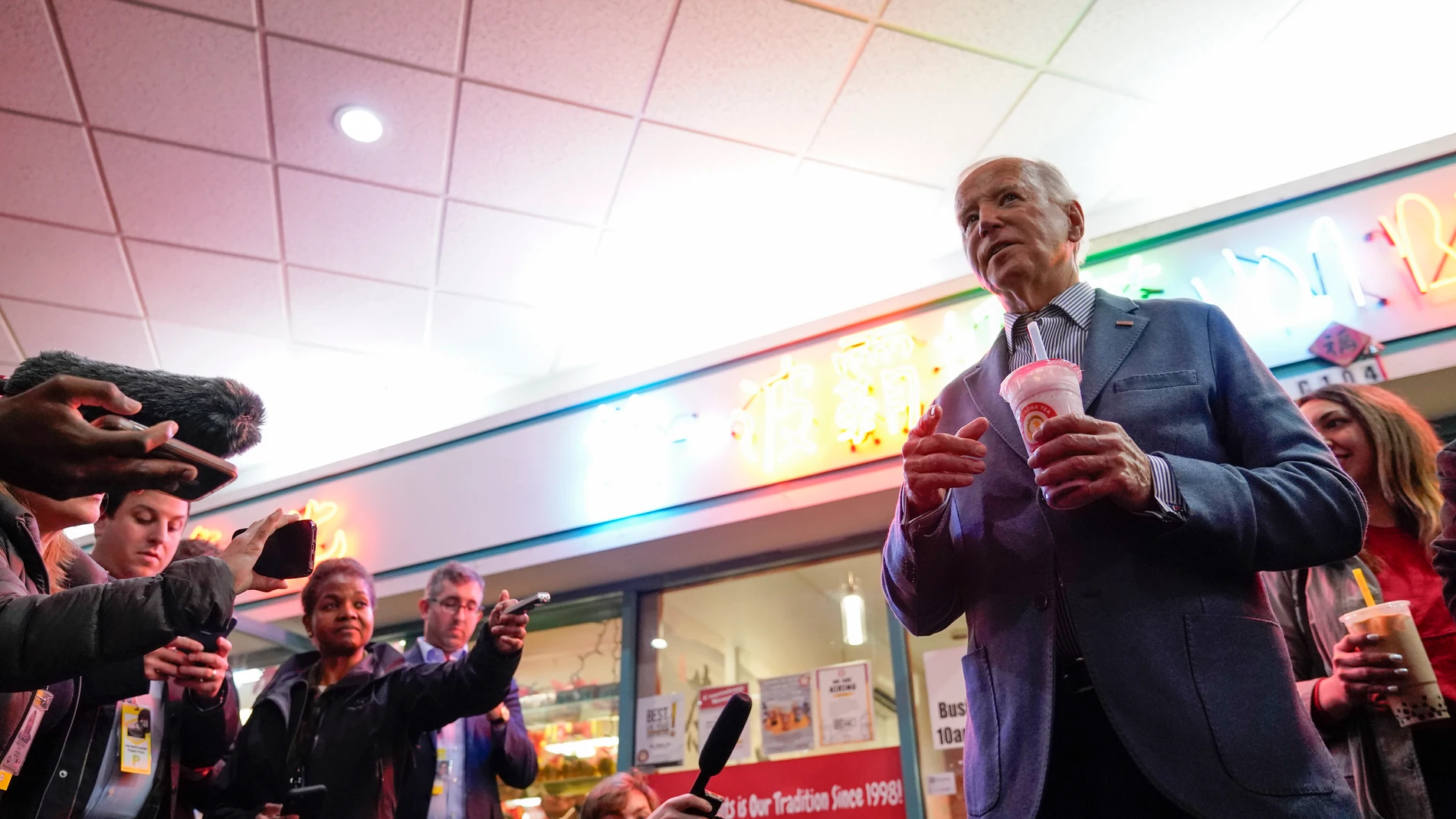 President Joe Biden talks to reporters after making a stop at No. 1 Boba Tea during a stop in Las Vegas, Monday, Feb. 5, 2024. (AP Photo/Stephanie Scarbrough)