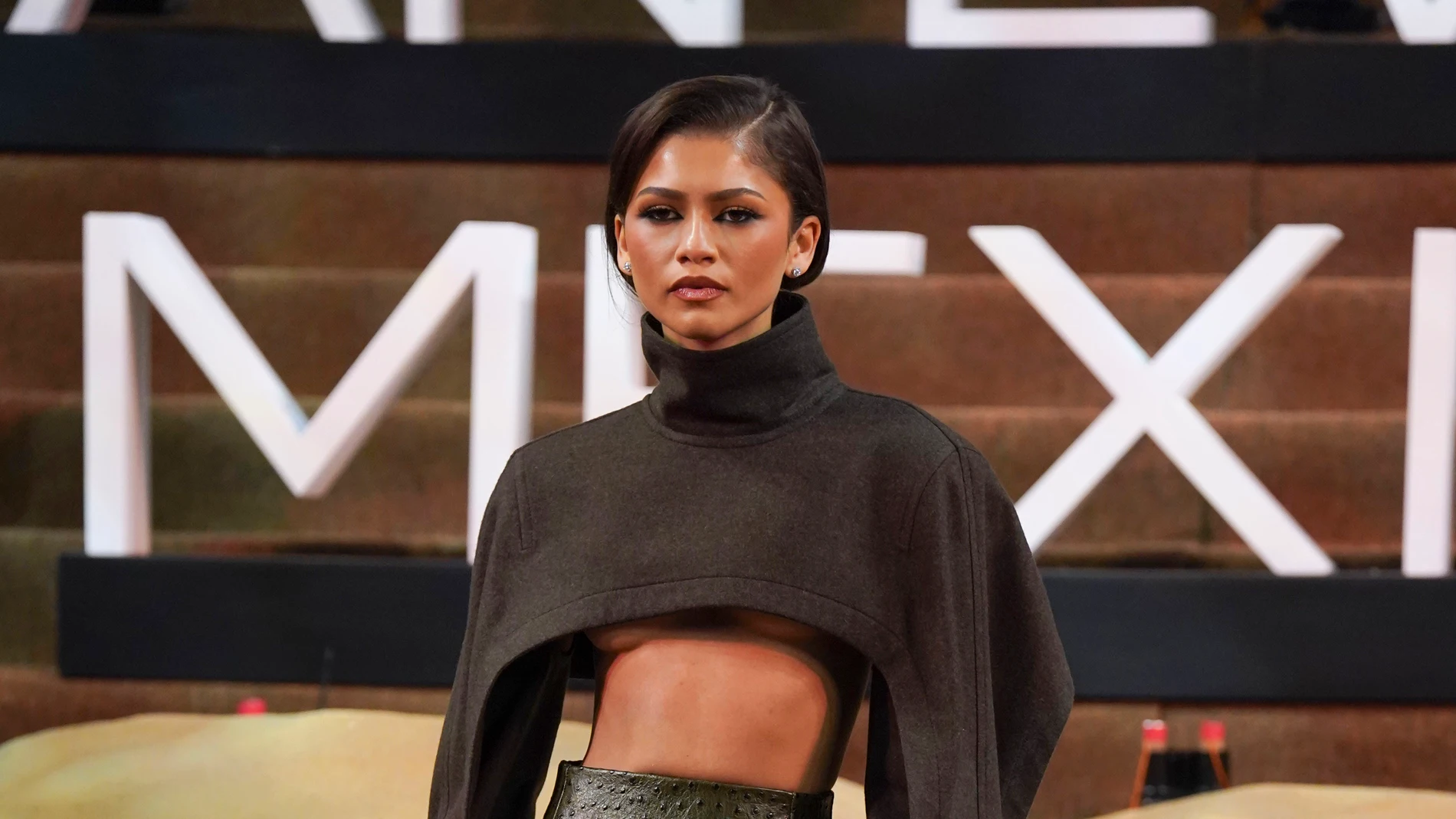American actress Zendaya poses for photographers as she arrives for a fan event promoting the film, Dune: Part Two, in Mexico City, Tuesday, Feb. 6, 2024. (AP Photo/Marco Ugarte)