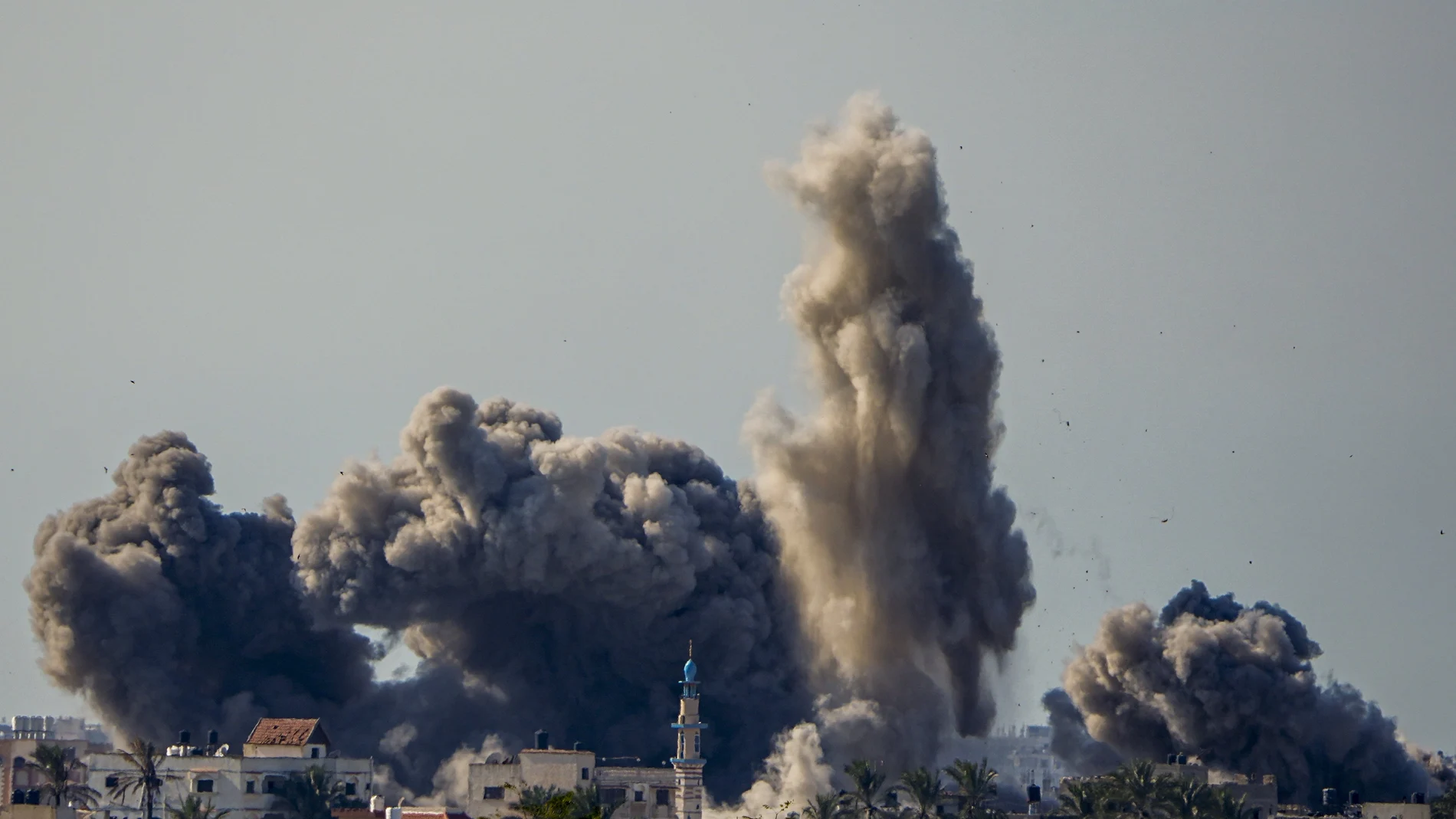 Smoke and explosion following an Israeli bombardment inside the Gaza Strip, as seen from southern Israel, Sunday, Feb. 11, 2024.
