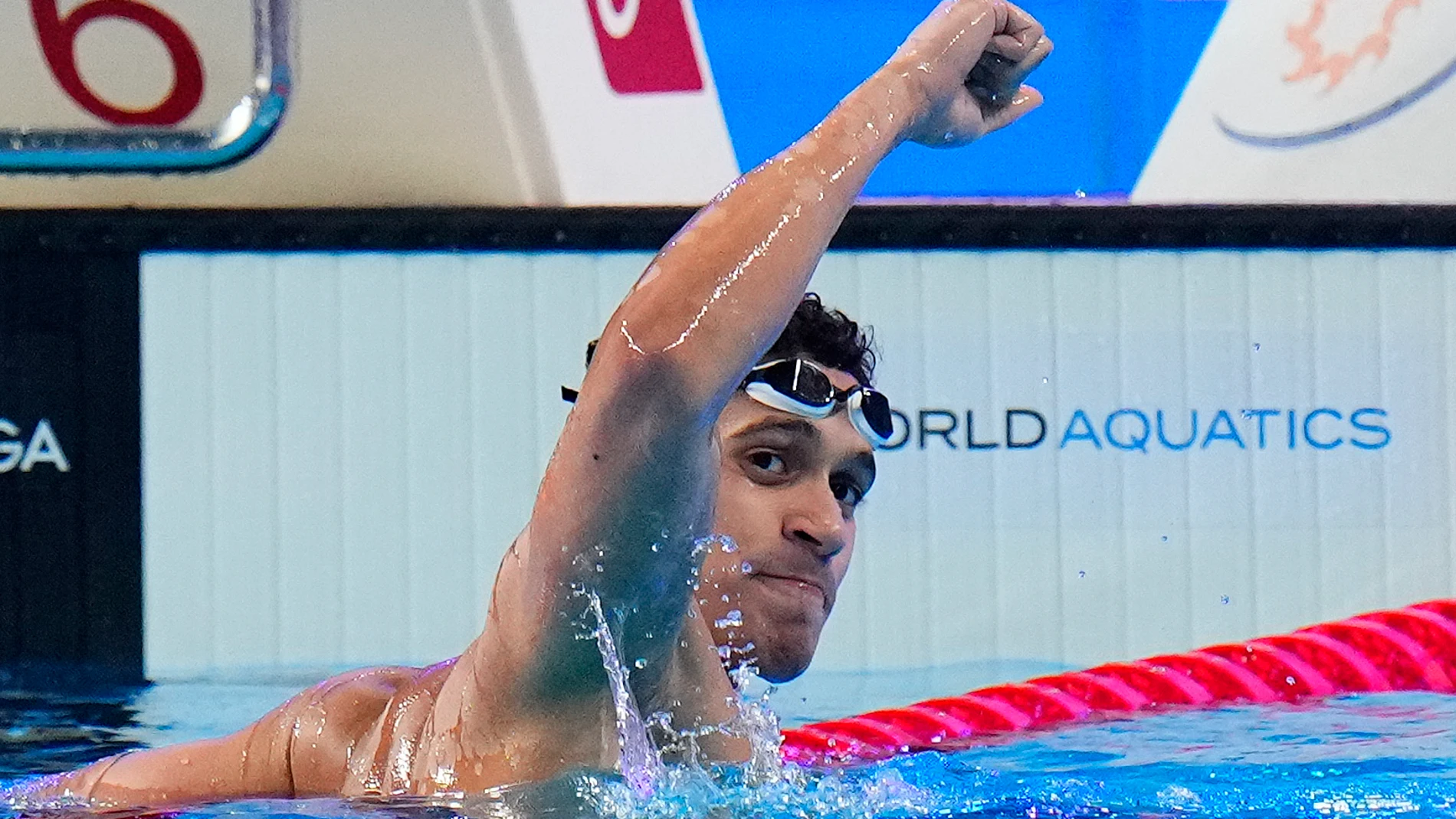 Hugo Gonzalez of Spain celebrates after winning the men's 200m backstroke final at the World Aquatics Championships in Doha, Qatar, Friday, Feb. 16, 2024. (AP Photo/Hassan Ammar)
