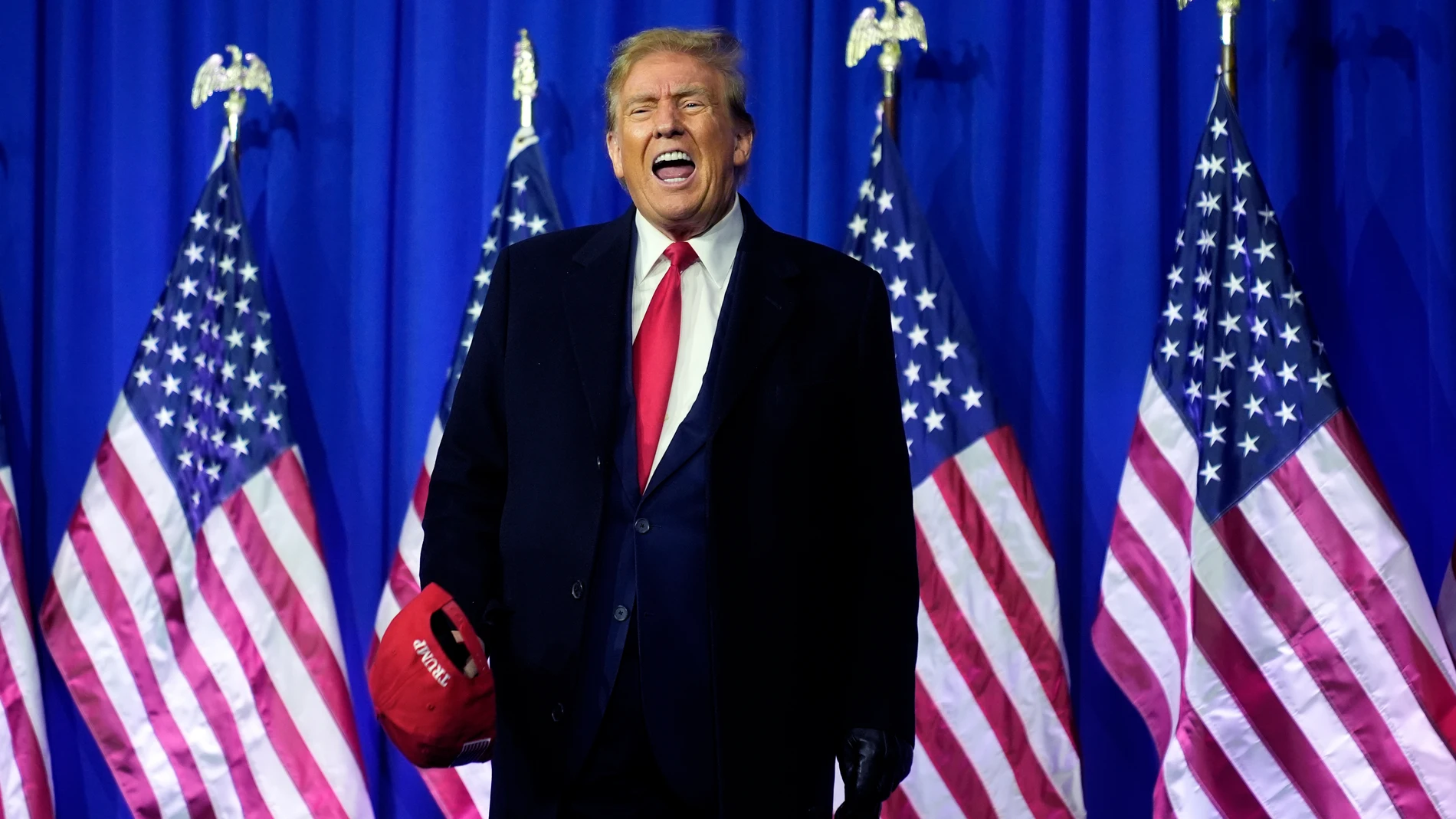 Republican presidential candidate former President Donald Trump yells on stage at a campaign rally in Waterford Township, Mich., Saturday, Feb. 17, 2024. (AP Photo/Paul Sancya)