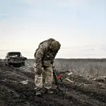 A serviceman from the 65th Separate Mechanized Brigade of the Land Forces of the Armed Forces of Ukraine is standing on the outskirts of Robotyne in the Zaporizhzhia region, southeastern Ukraine.