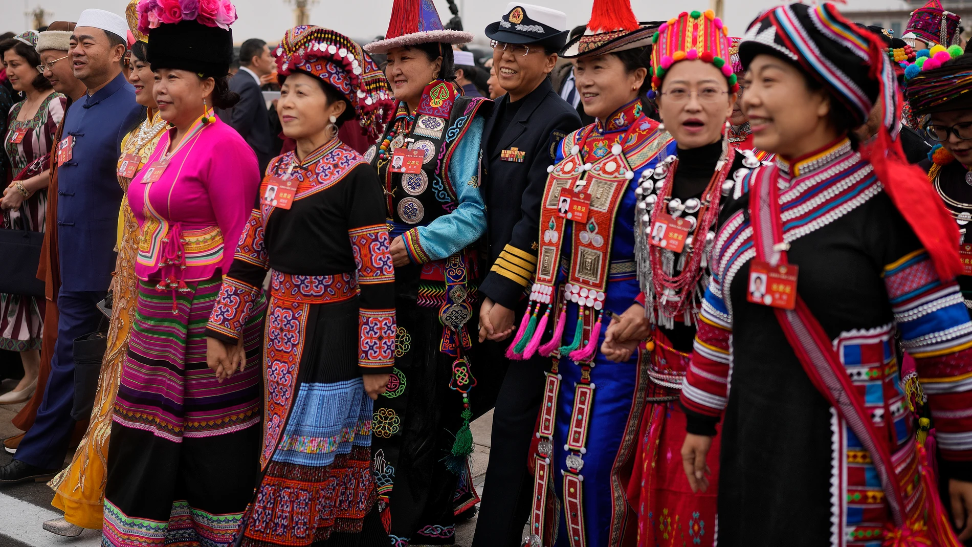 Ethnic minority delegates arrive to attend the opening session of the Chinese People's Political Consultative Conference (CPPCC) at the Great Hall of the People in Beijing, Monday, March 4, 2024. (AP Photo/Andy Wong)
