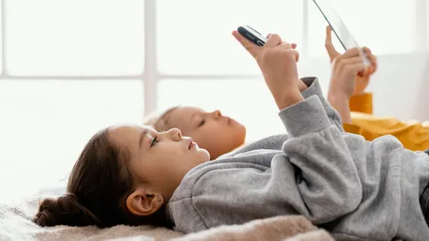 Niños con teléfonos móviles