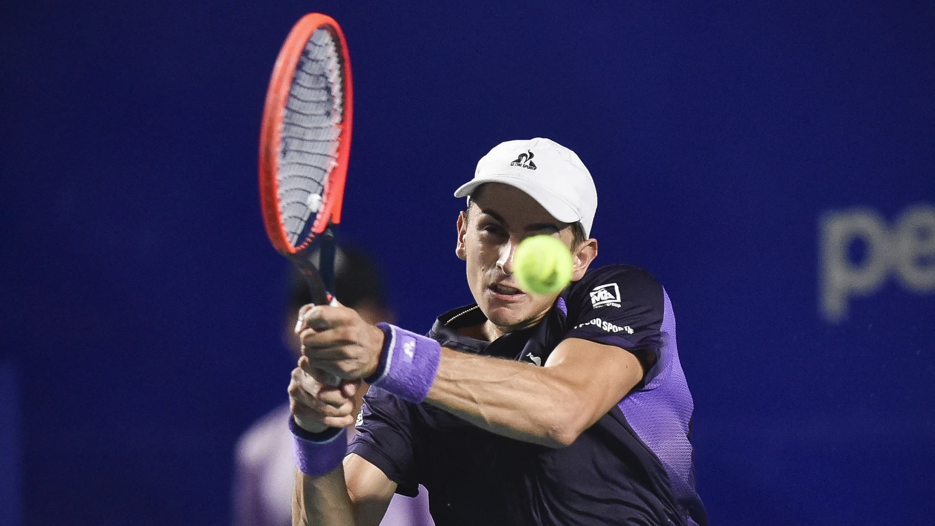 Italy's Matteo Arnaldi hits a return against USA's Taylor Fritz during the Mexico ATP Open 500 men's round of 32 tennis match at Arena GNP Seguros in Acapulco, Guerrero , Mexico on February 26, 2024.