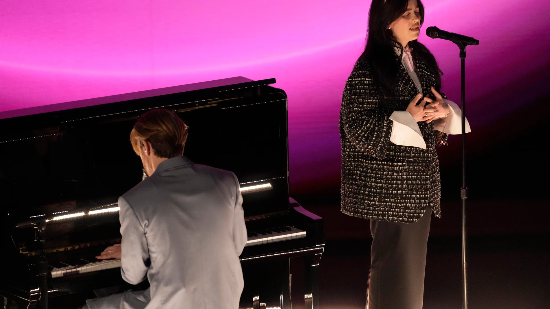 Finneas, left, and Billie Eilish perform "What Was I Made For?" from "Barbie" during the Oscars on Sunday, March 10, 2024, at the Dolby Theatre in Los Angeles. (AP Photo/Chris Pizzello)