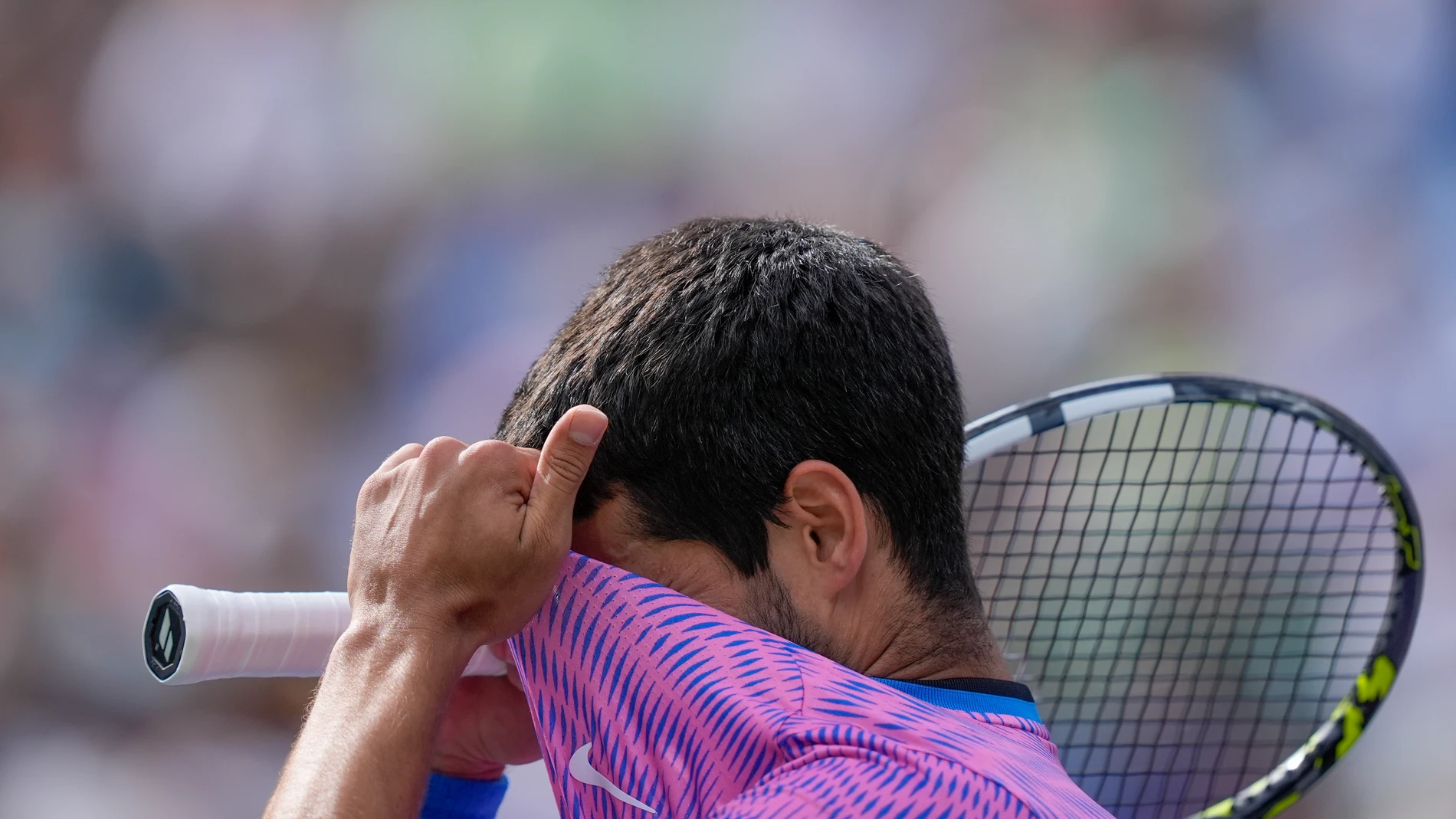Carlos Alcaraz, of Spain, reacts after losing a point to Daniil Medvedev, of Russia, during the final match at the BNP Paribas Open tennis tournament, Sunday, March 17, 2024, in Indian Wells, Calif. (AP Photo/Ryan Sun)