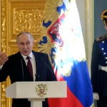 Russian President Vladimir Putin meets election agents at the Kremlin