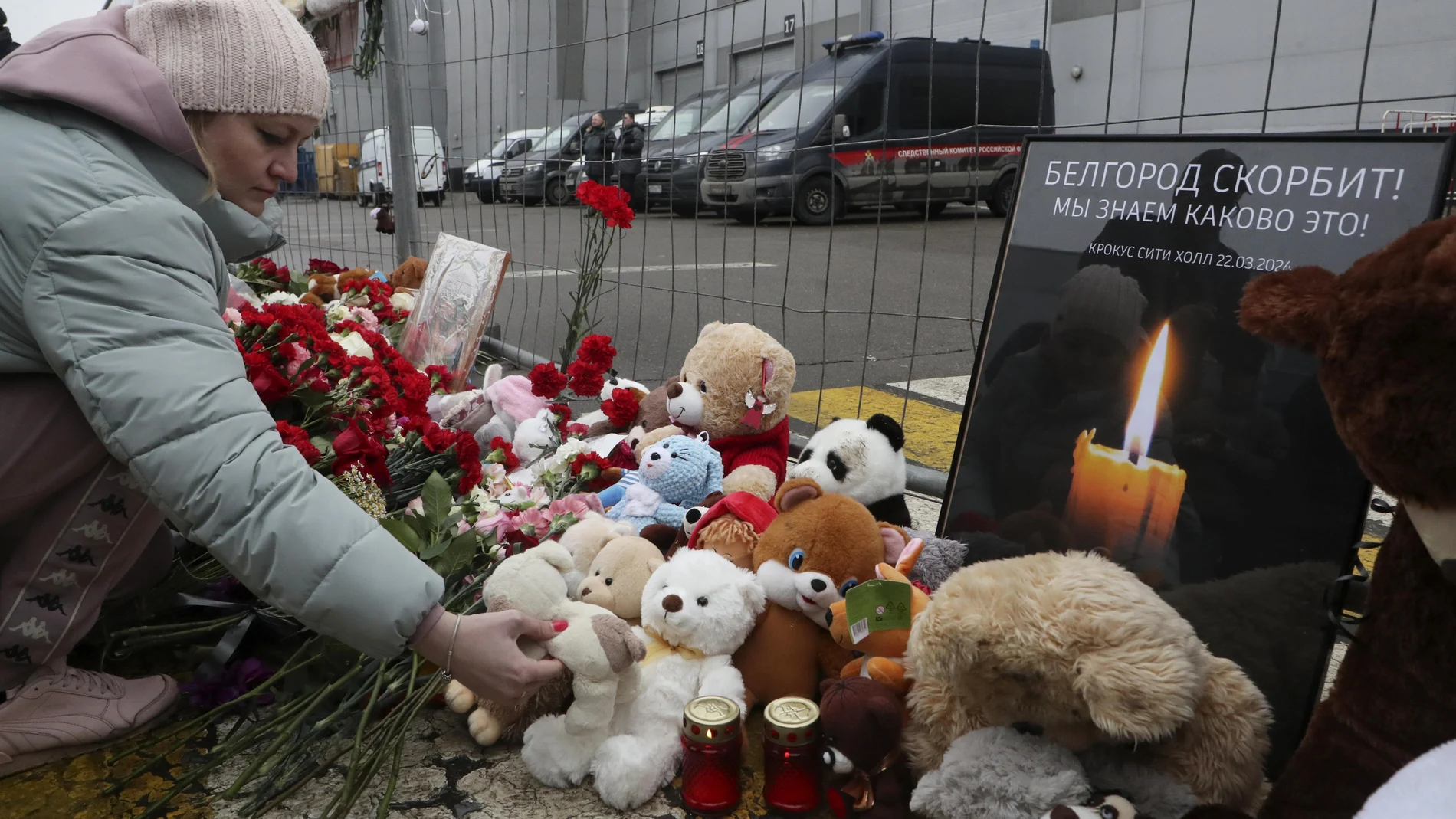 A woman mourns and brings a toy at the Crocus City Hall concert venue following a terrorist attack in Krasnogorsk, outside Moscow, Russia, 23 March 2024.