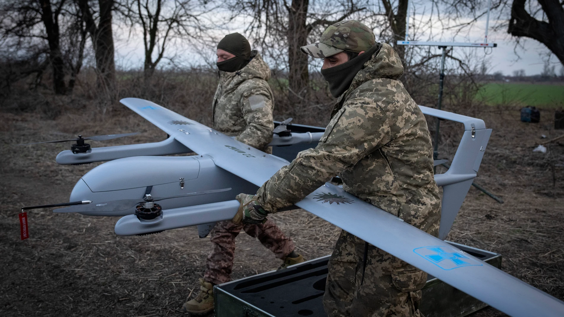 Ukrainian soldiers of the 22nd Mechanised brigade prepare to start the Poseidon H10 Middle-range UAV at the front-line, near Bakhmut, Donetsk region, Ukraine, Tuesday, March 26, 2024. (AP Photo/Efrem Lukatsky)