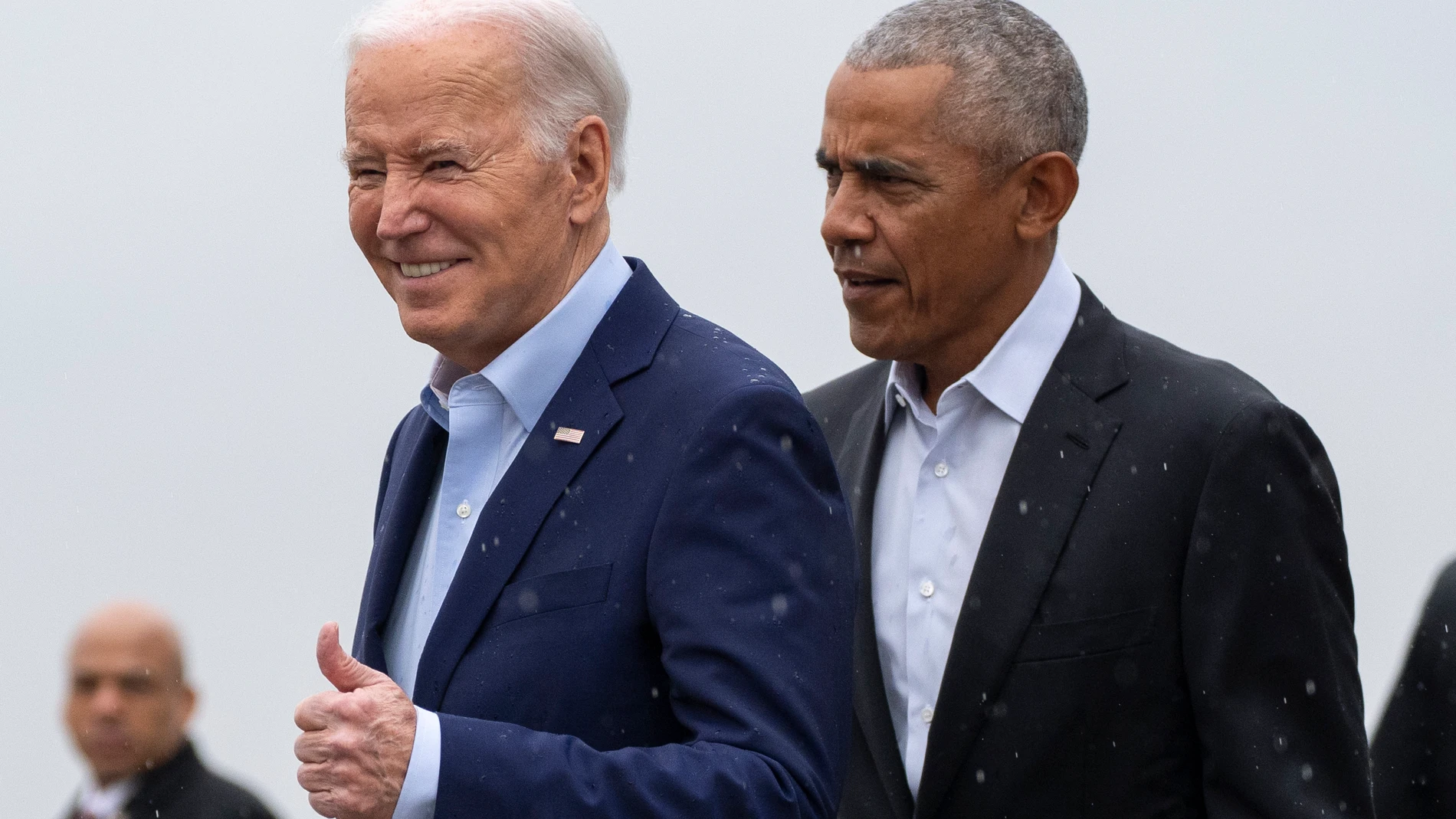 President Joe Biden, left, and former President Barack Obama arrive at John F. Kennedy International Airport, Thursday, March 28, 2024, in New York. (AP Photo/Alex Brandon)