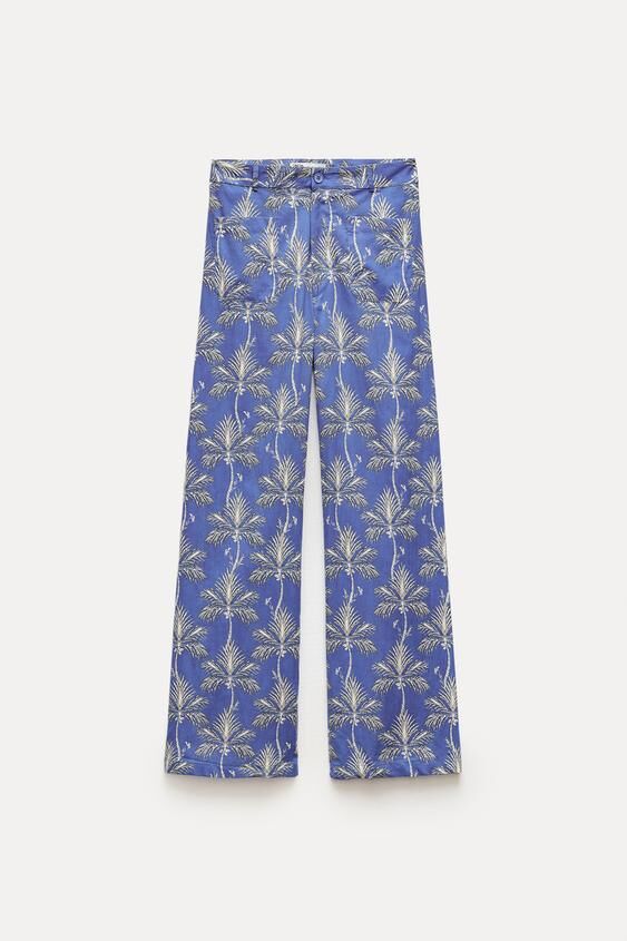 Pantalones con estampado de palmeras
