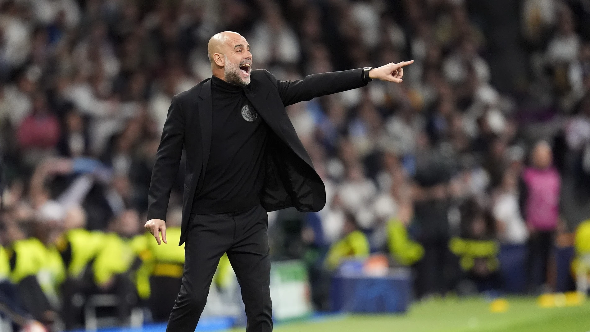 09 April 2024, Spain, Madrid: Manchester City manager Pep Guardiola gestures on the touchline during the UEFA Champions League quarter-final first leg soccer match between Real Madrid and Manchester City at the Santiago Bernabeu Stadium. Photo: Nick Potts/PA Wire/dpa09/04/2024 ONLY FOR USE IN SPAIN