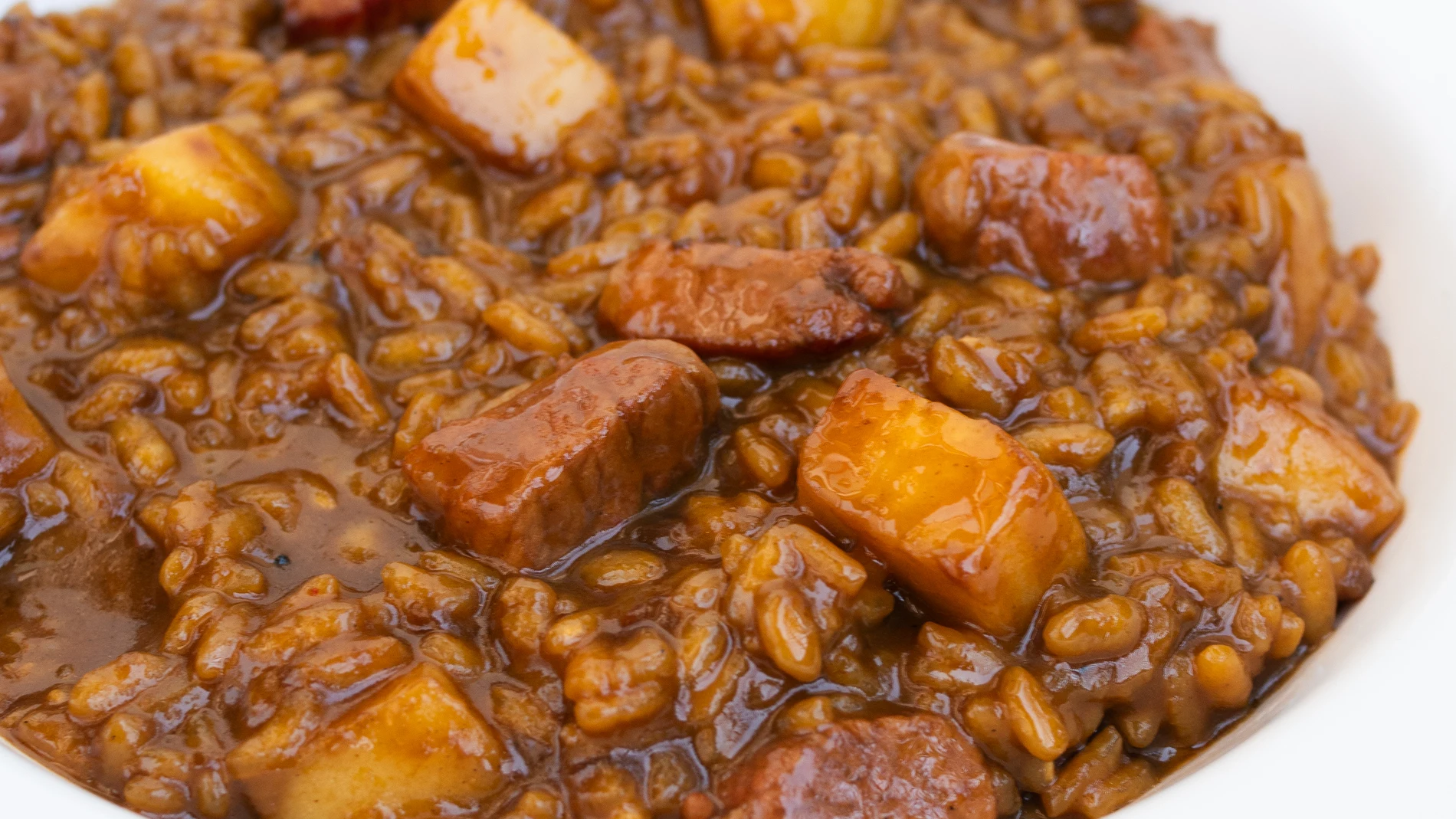 Arroz meloso con secreto de cerdo y manzana