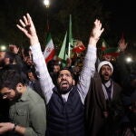 Iranians celebrate following Iran's launch of drone attacks towards Israel