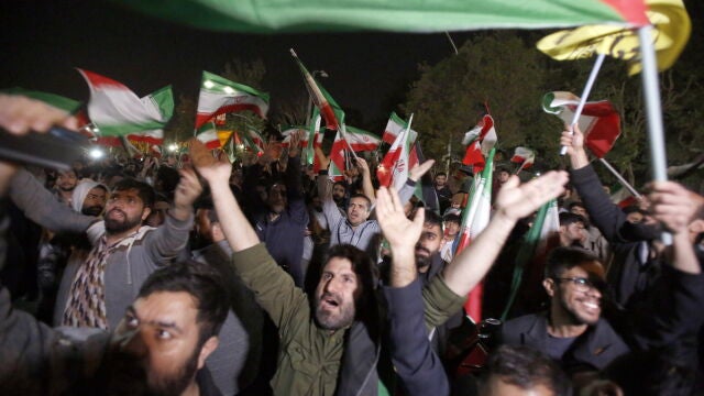 Iranians celebrate following Iran's launch of drone attacks towards Israel