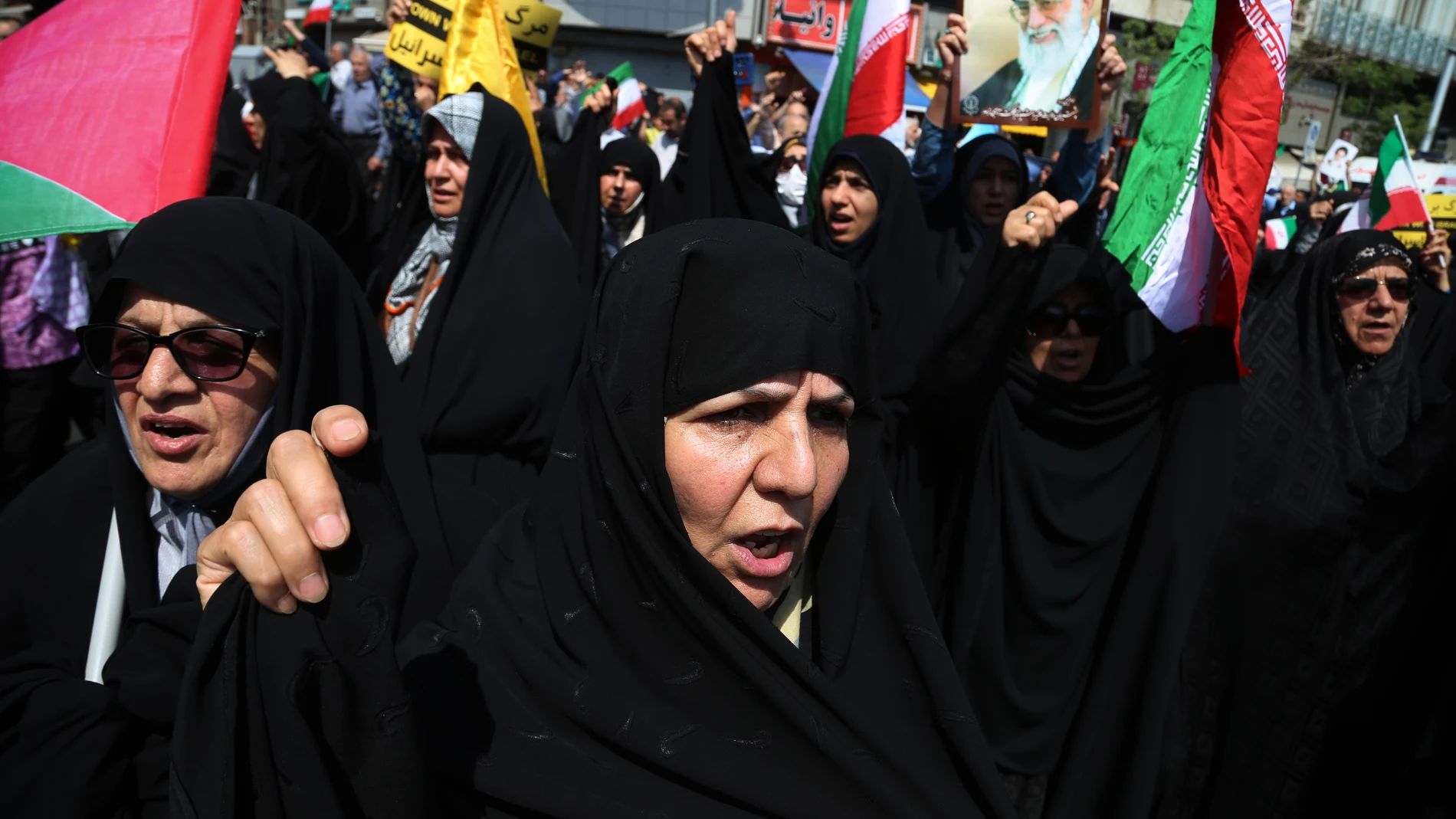 April 19, 2024, Tehran, Iran: Iranian veiled women in black Chadors chant slogans during an anti-Israel rally in Tehran. Air defense systems over the central city of Isfahan destroyed three aerial objects early on April 19. The explosions come after a drone and missile attack carried by Iran's Islamic Revolutionary Guards Corps (IRGC) towards Israel on April 13, following an airstrike on the Iranian embassy in Syria, which Iran claimed was conducted by Israel. World leaders appealed for calm ...