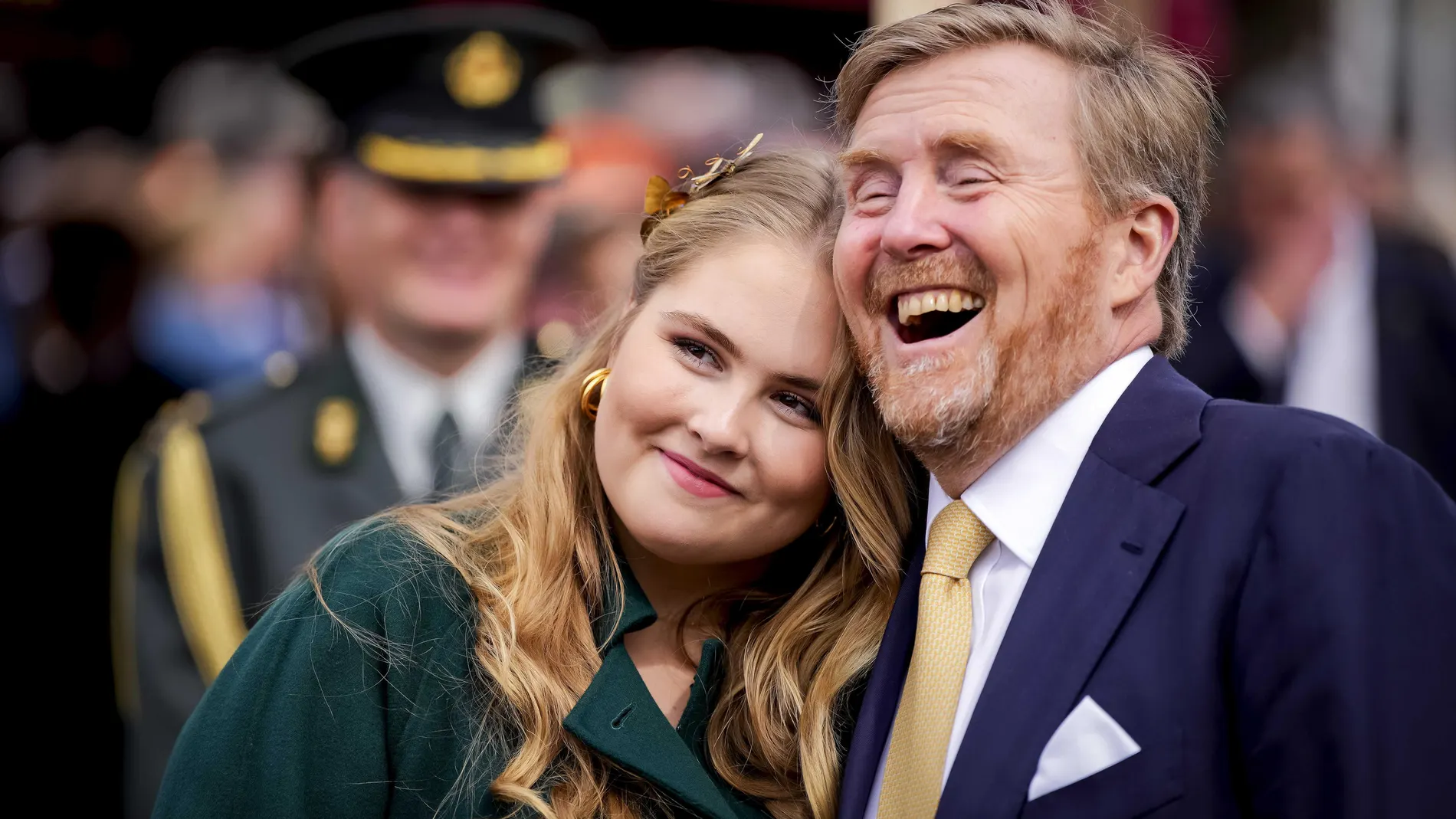 Emmen (Netherlands), 27/04/2024.- Princess Amalia and King Willem-Alexander of the Netherlands laugh during the King's Day in Emmen, the Netherlands, 27 April 2024. The royal family and members of the royal family walk on a route through the city in the province of Drenthe, covering themes such as culture, innovation and sport. King's day celebrates the 57th birthday of King Willem-Alexander. (Países Bajos; Holanda) EFE/EPA/Freek van den Bergh 
