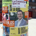  Detalle de un poste con carteles electorales de varios partidos para las elecciones catalanas del 12-M. 