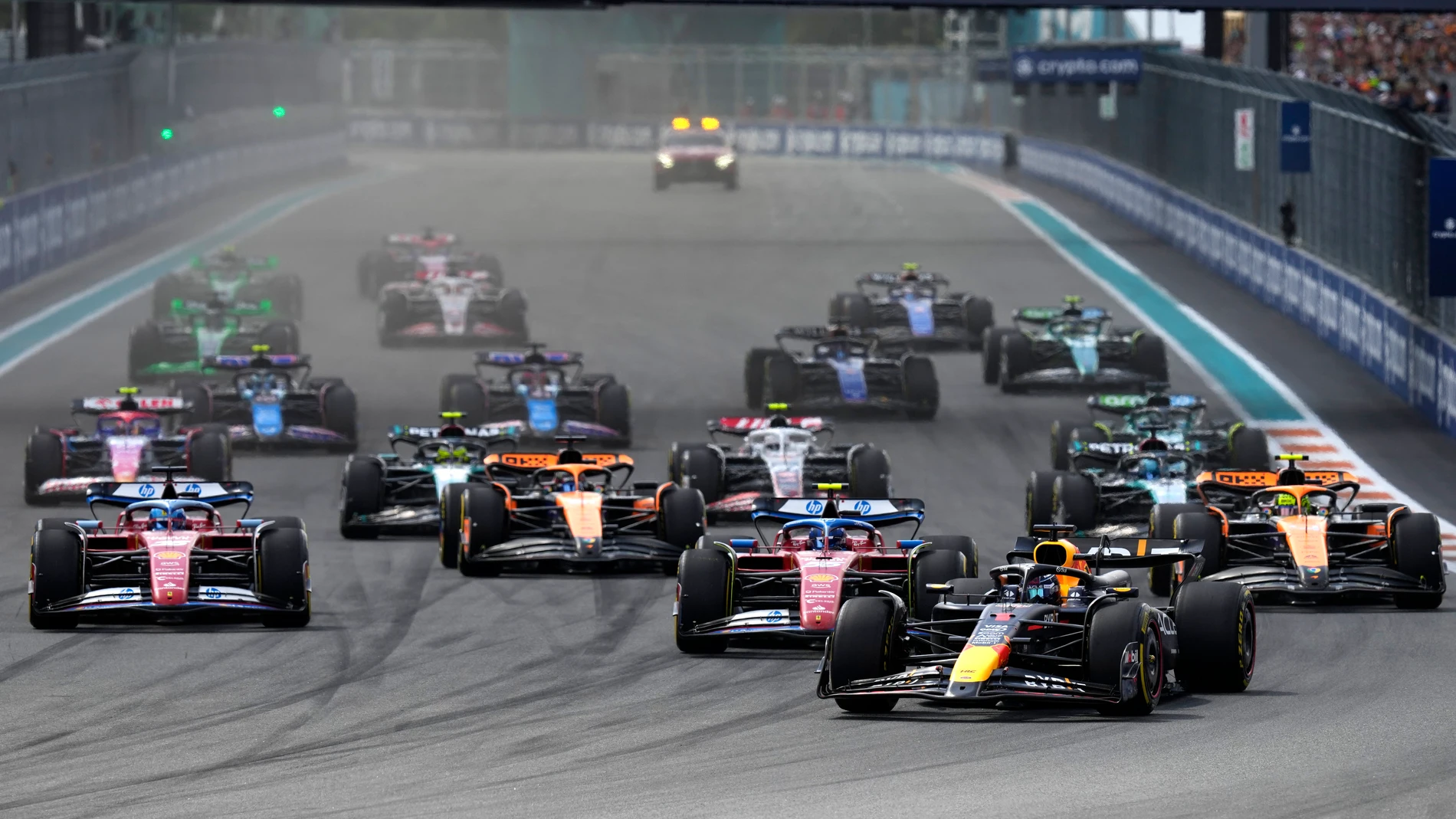Drivers steer their cars during the Miami Formula One Grand Prix auto race Sunday, May 5, 2024, in Miami Gardens, Fla. (AP Photo/Rebecca Blackwell)