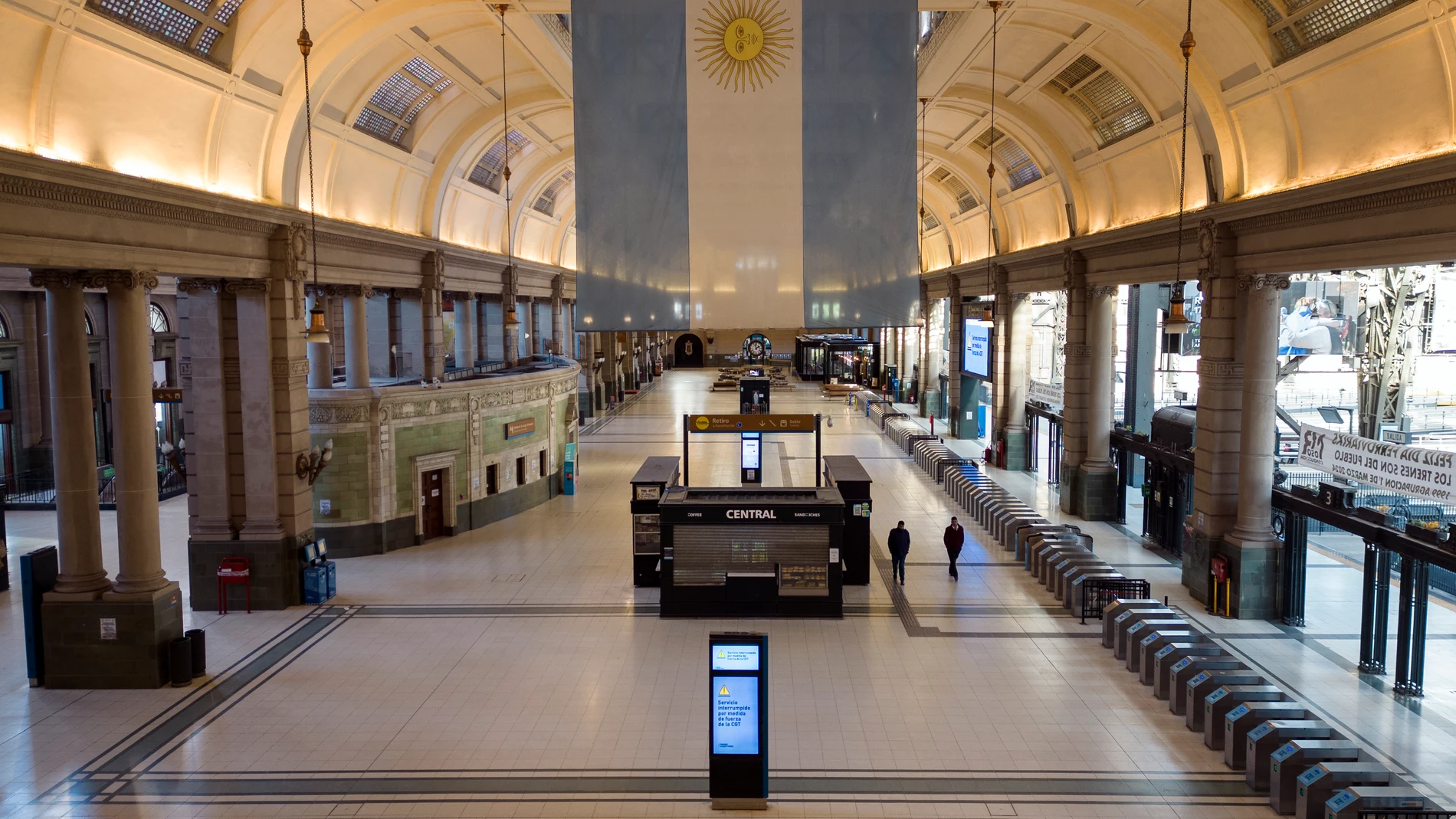 The Retiro train station hall is empty of commuters due to a general strike against the reforms of President Javier Milei in Buenos Aires, Argentina, Thursday, May 9, 2024. (AP Photo/Rodrigo Abd)