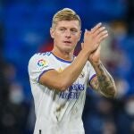 Real Madrid's Toni Kroos applauds at the end of the Spanish La Liga soccer match between Real Madrid and Rayo Vallecano at the Bernabeu stadium in Madrid.