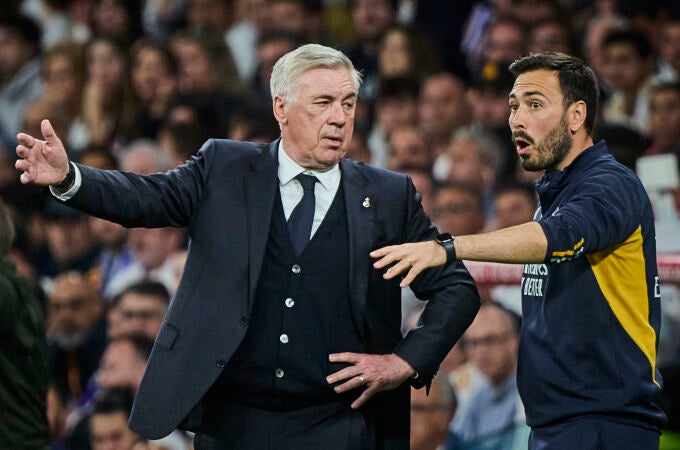 Carlo y Davide Ancelotti, durante un partido del Real Madrid