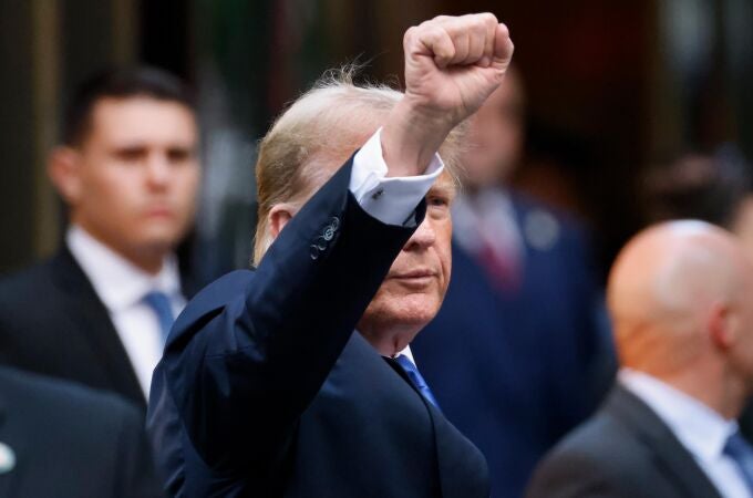 Former US President Donald Trump gestures to the media and the crowd outside of Trump Tower after a jury found him guilty on all 34 counts in his criminal trial in New York State Supreme Court in New York, New York, USA, 30 May 2024. 