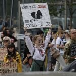 Ukrainians hold placards reading 'Captivity is killing!', 'Don't be silent!', 'Free Azov', among others, during a rally calling for authorities to return their relatives from Russian captivity, in downtown Kyiv, Ukraine.