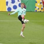 Austria's Philipp Lienhart controls the ball during a public training session in Berlin.
