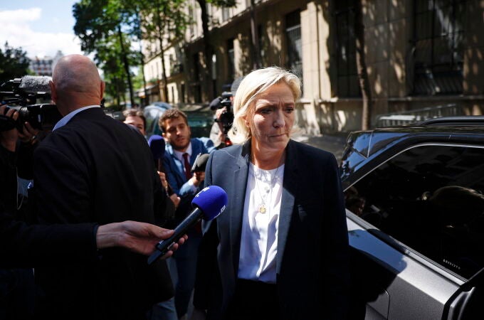 Marine Le Pen leaves the Rassemblement National (RN) party headquaters in Paris