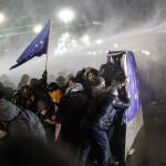 Police use water cannons and tear gas to disperse Georgian opposition supporters as they protest in front of the Parliament building in Tbilisi, Georgia, 29 November 2024. 