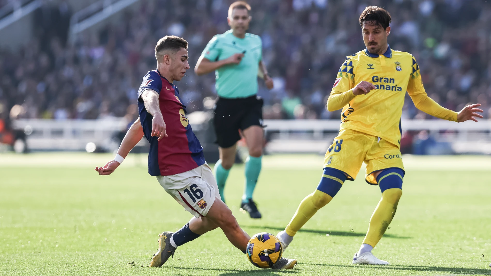 Fermin Lopez of FC Barcelona and Jose Campana of UD Las Palmas in action during the Spanish league, La Liga EA Sports, football match played between FC Barcelona and UD Las Palmas at Estadio Olimpico de Montjuic on November 30, 2024 in Barcelona, Spain. AFP7 30/11/2024 ONLY FOR USE IN SPAIN